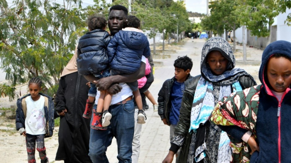 Migrants told journalists they want to be taken to a country that will 'respect us as human'