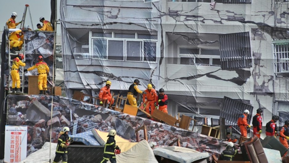 Taiwan stages mock disaster and war drills involving volunteers and emergency workers in Taichung city, three days after China finished war games in which it simulated encircling the self-ruled island