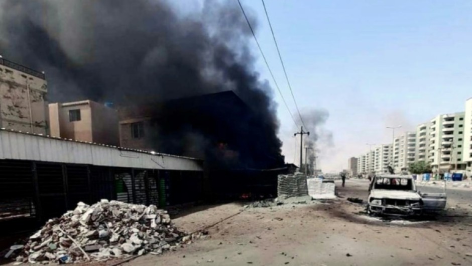 Sudanese civlians desperate to escape the fighting in the capital Khartoum prepare to board a bus out