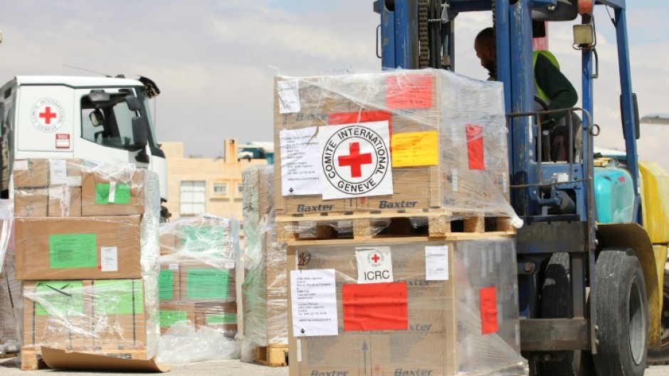 Boxes of humanitarian aid in Amman, Jordan are readied for a flight to Port Sudan