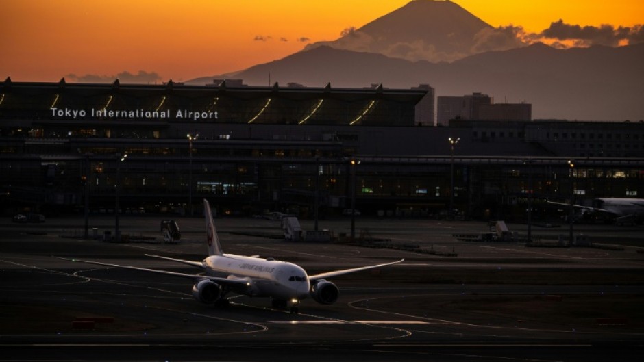 Japan Airlines has logged its first annual net profit in three years