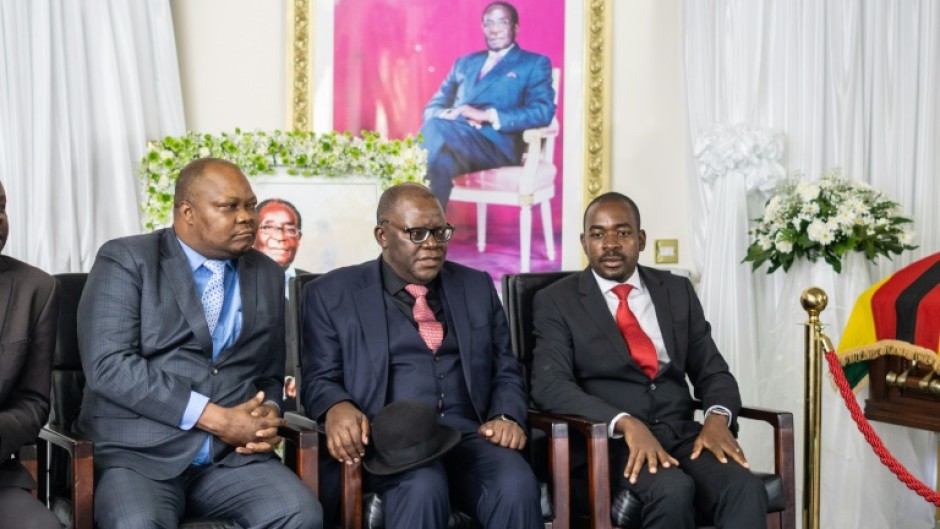 Job Sikhala (left) at the lying in state of Zimbabwe's late president Robert Mugabe in 2019