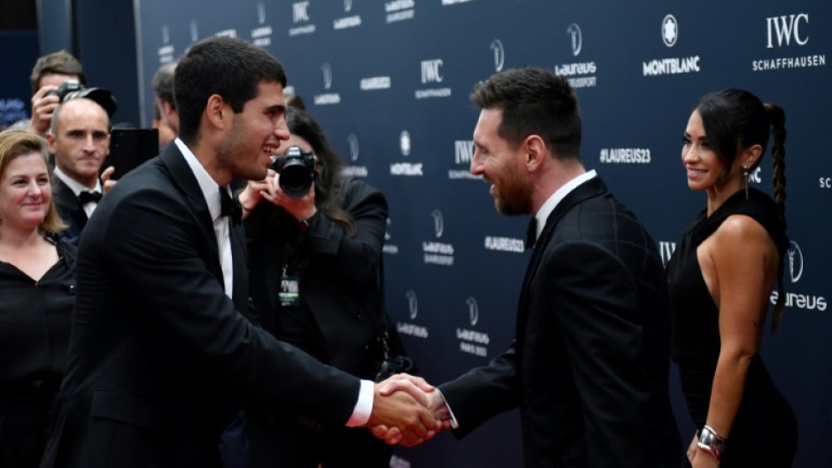 Lionel Messi meets another Laureus award winner Carlos Alcaraz (left) 