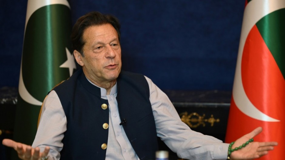 Former cricketing superstar Imran Khan (pictured at his Lahore residence in March 2023) has previously denied all the charges in dozens of cases brought against him