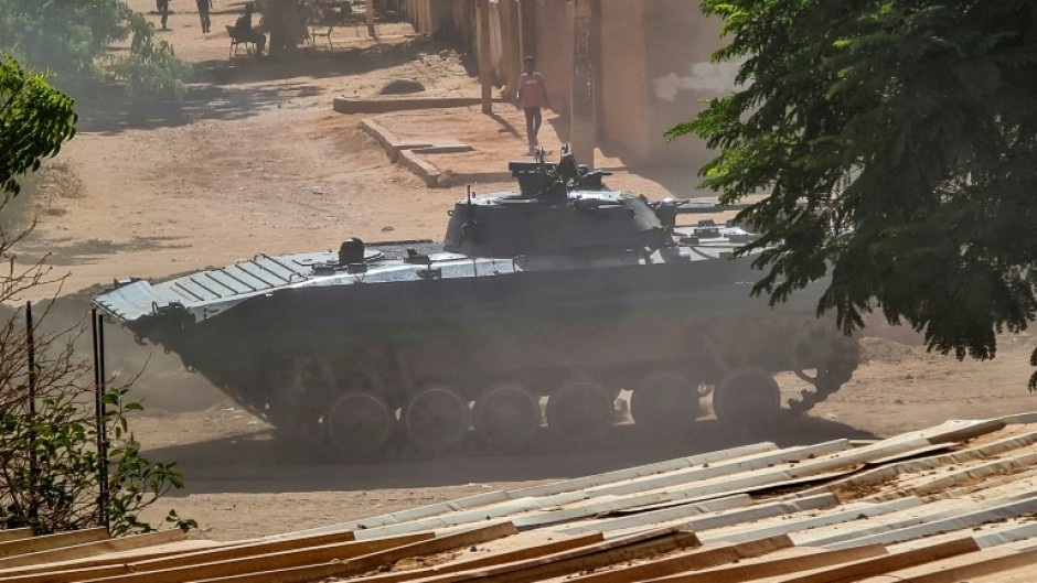 A Sudanese army armoured vehicle is stationed in southern Khartoum, after the latest ceasefire announcement