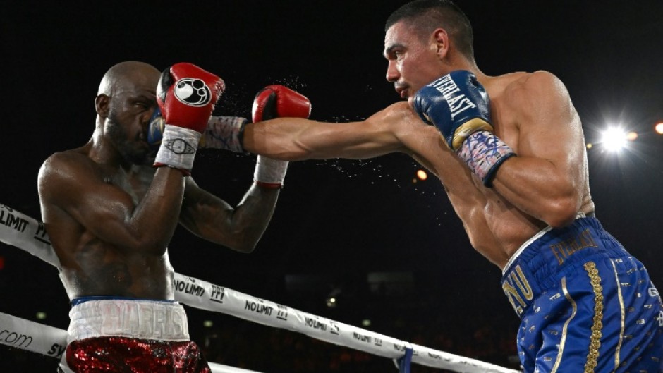 Australian boxer Tim Tszyu (R) has had surgery, reportedly for a dog bite