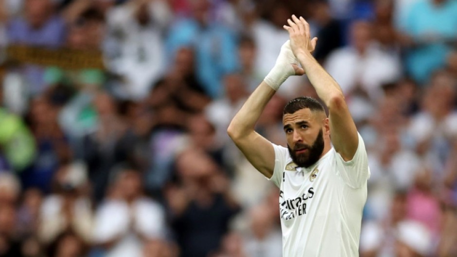 Karim Benzema applauds as he is substituted during his final appearance for Real Madrid