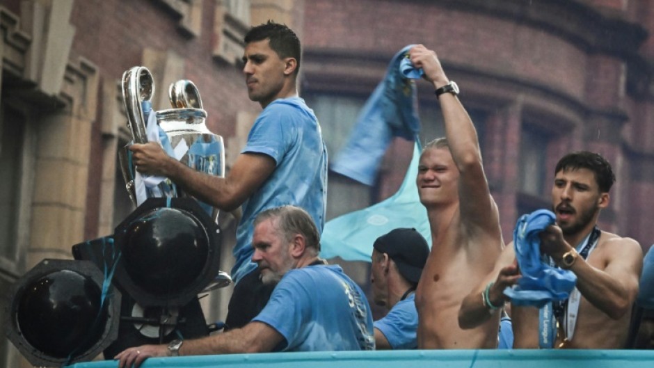 Manchester City players celebrated winning the treble