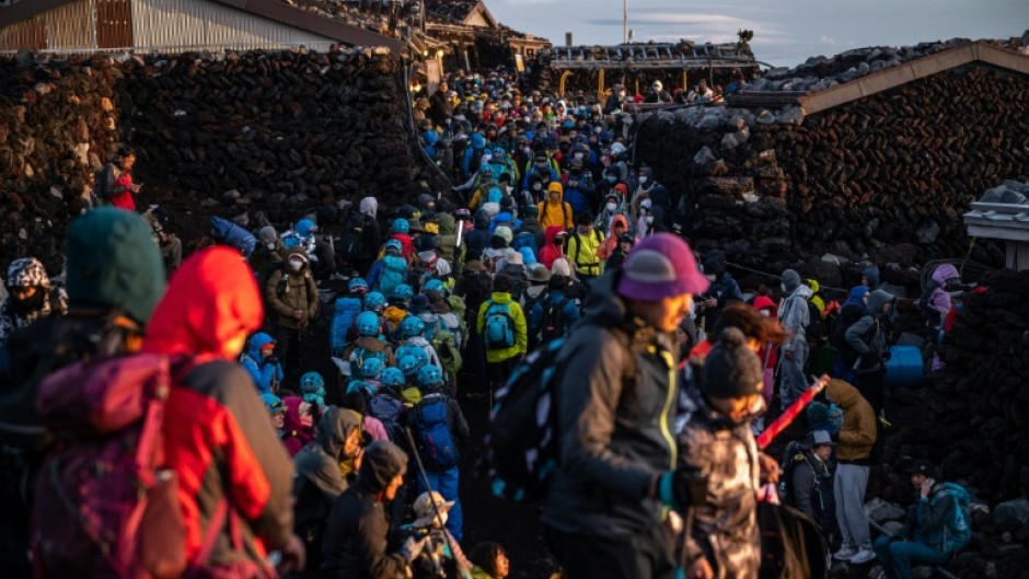 An 'unprecedented' number of people are expected to try and climb Mount Fuji this year