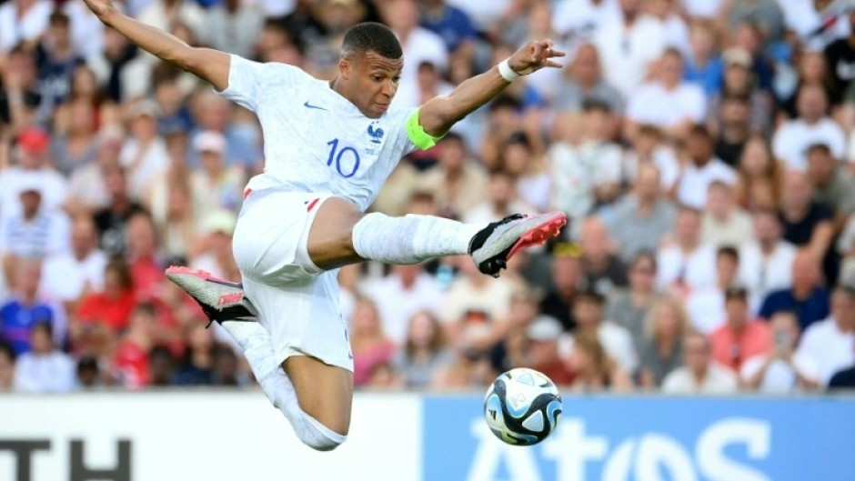 Paris Saint-Germain's France forward Kylian Mbappe in action in a Euro 2024 qualifier against Gibraltar in Faro on June 16