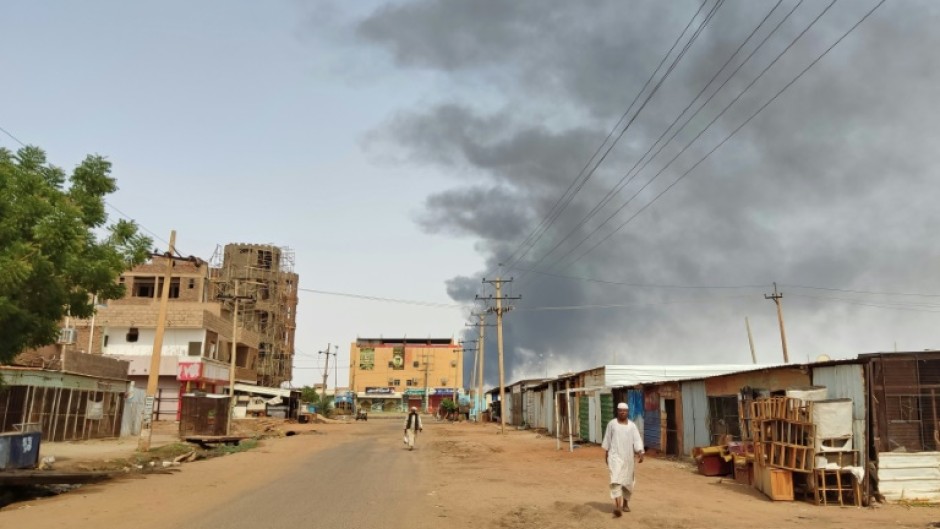 Smoke billows in southern Khartoum on June 12, 2023 where rival forces traded gunfire and shelling