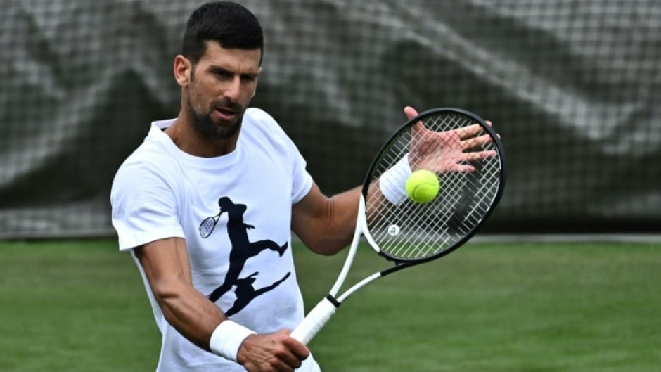 'Hungry' man: Novak Djokovic trains at Wimbledon