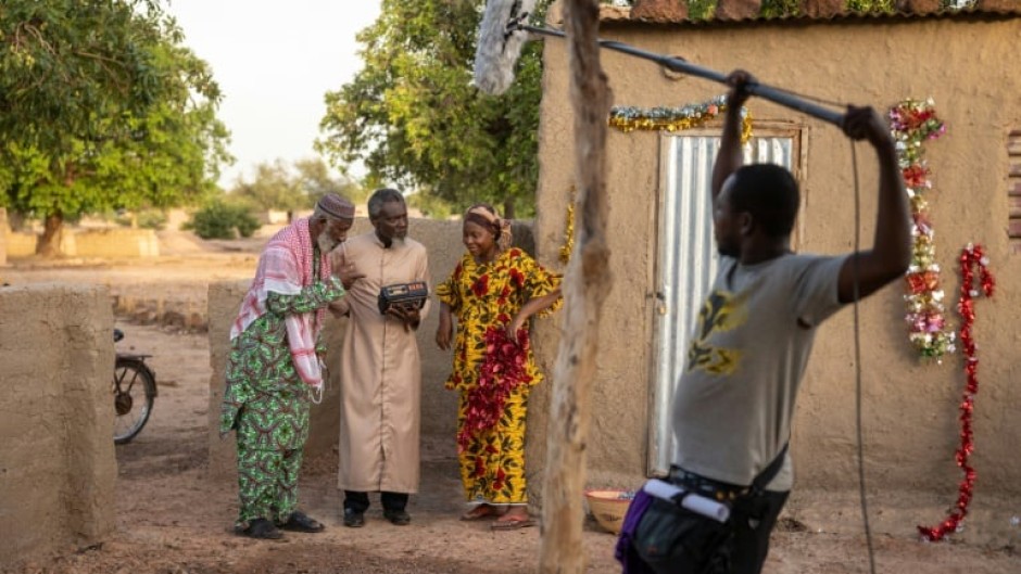 It takes a village: Actors (from left) Rasmane Ouedraogo, Ildevert Meda and Aminata Diallo-Glez on the set of 'Welcome to Kikideni'