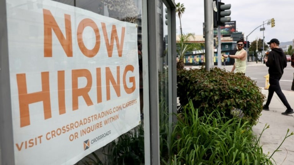 The rate of hiring slowed in the United States last month while wage growth accelerated