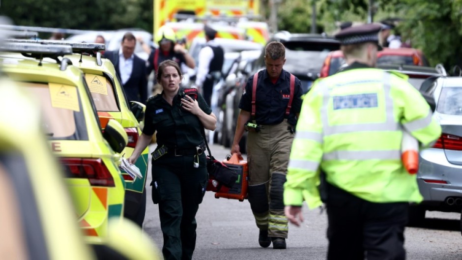 Two remain in critical condition after a car crashed into the building of a London primary school, leaving an eight-year-old girl dead