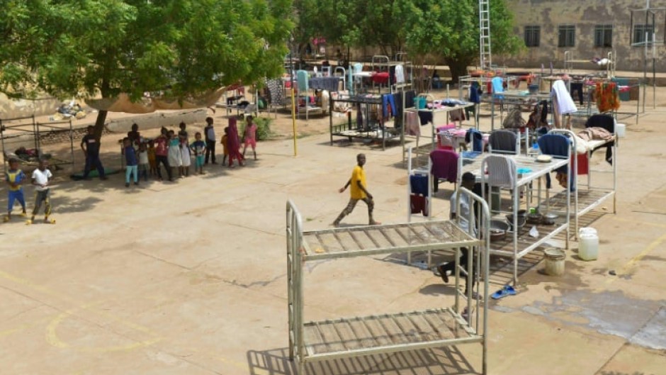 Some of the more than 2.2 million people internally displaced by Sudan's war are staying at a university, turned into a makeshift shelter, in al-Hasaheisa south of Khartoum