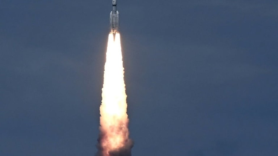 India launched a rocket on Friday carrying an unmanned spacecraft to land on the Moon