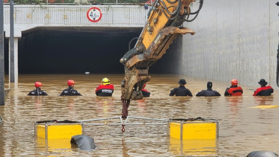 Rescue workers were struggling to reach more than 10 cars trapped in a 430-metre underground tunnel in Cheongju, North Chungcheong province