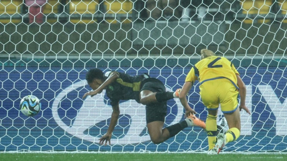 South Africa's forward Hildah Magaia scores her team's goal