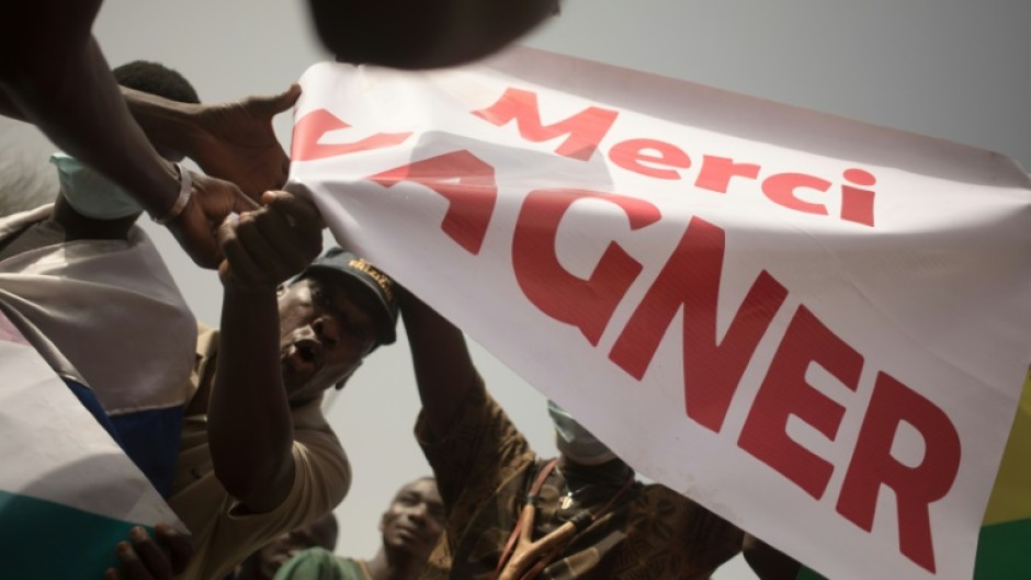 Malian demonstrators hold up a banner reading 'Thank you, Wagner' in February 2022. Mali's junta brought in Russian paramilitaries to support the army in the fight against jihadists