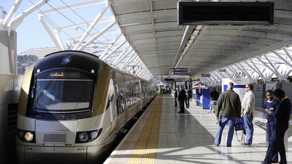 File: Passengers wait to get on the Gautrain in Pretoria. 