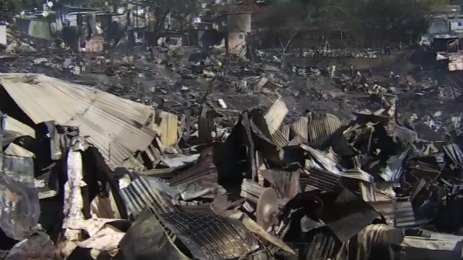 Over a thousand shacks have been destroyed in a fire at Kennedy Road Informal Settlement in Durban. (eNCA\screenshot)