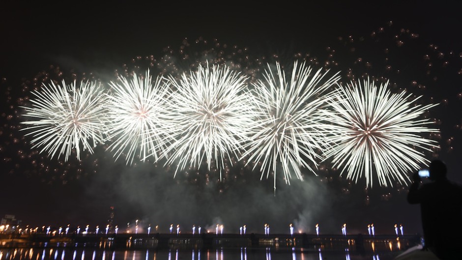 Fireworks light up the sky over the General de Gaulle bridge and the Ebrie lagoon during New Year's celebrations in Abidjan.