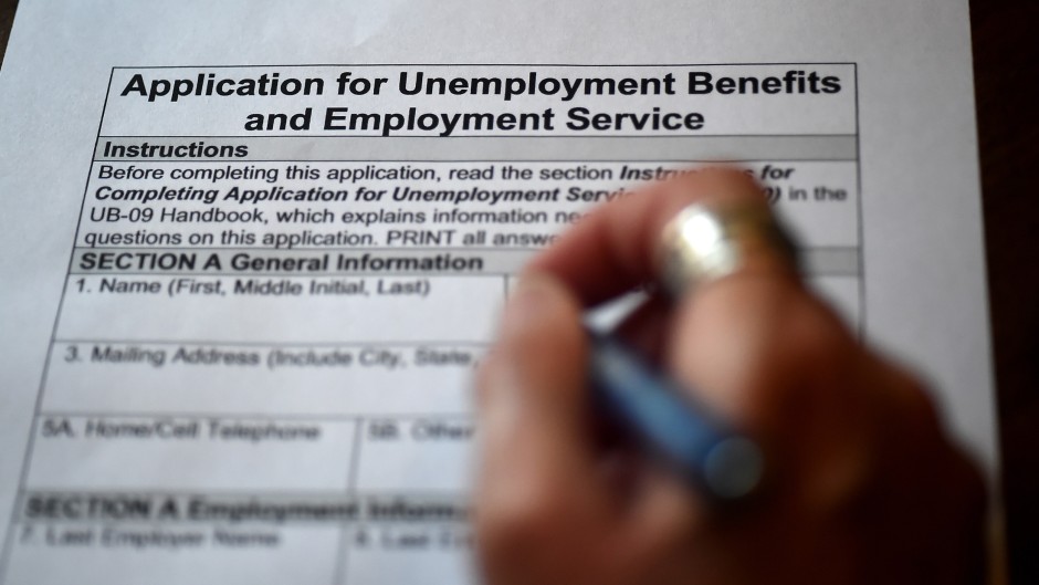 File: Half of all jobs at risk are in customer service and sales, food service and builder occupations.