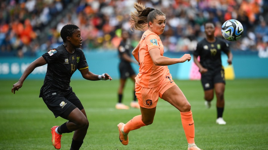 Netherlands' forward #11 Lieke Martens (R) and South Africa's defender #14 Tiisetso Makhubela vie for the ball during the Australia and New Zealand 2023 Women's World Cup round of 16 football match between Netherlands and South Africa at Sydney Football Stadium in Sydney on August 6, 2023. (Photo by FRANCK FIFE / AFP)