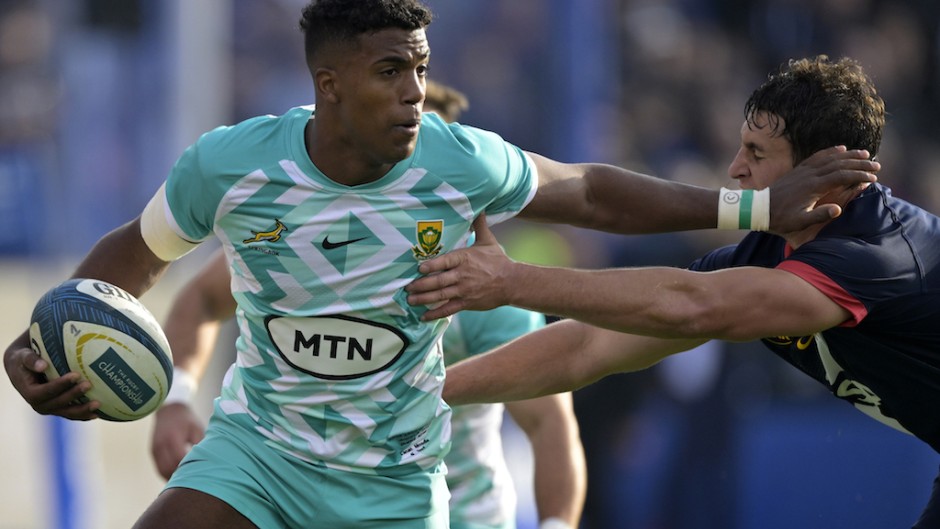 Canan Moodie (L) runs through a tackle by Argentina's Los Pumas Juan Martin Gonzalez Samso during the Rugby Union test match. AFP/JUAN MABROMATA