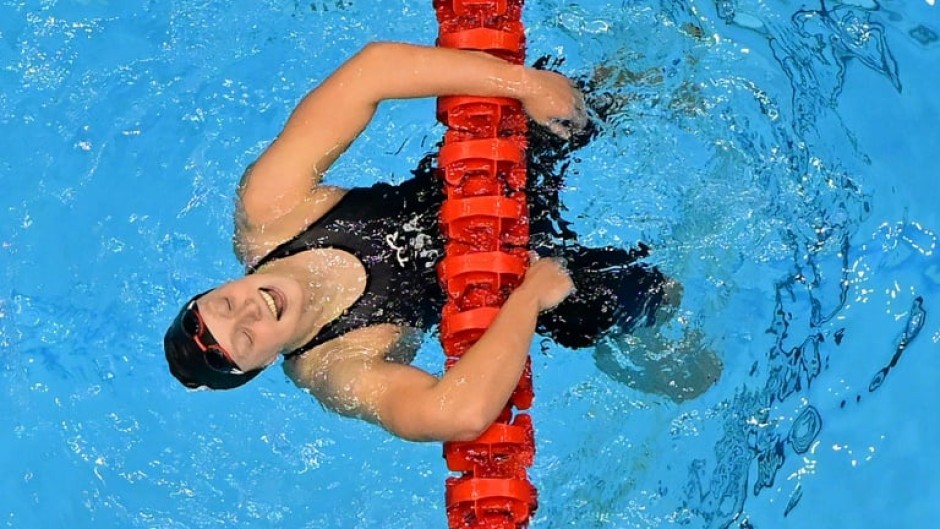 Swimming great Katie Ledecky carved her name deeper into the sport's history