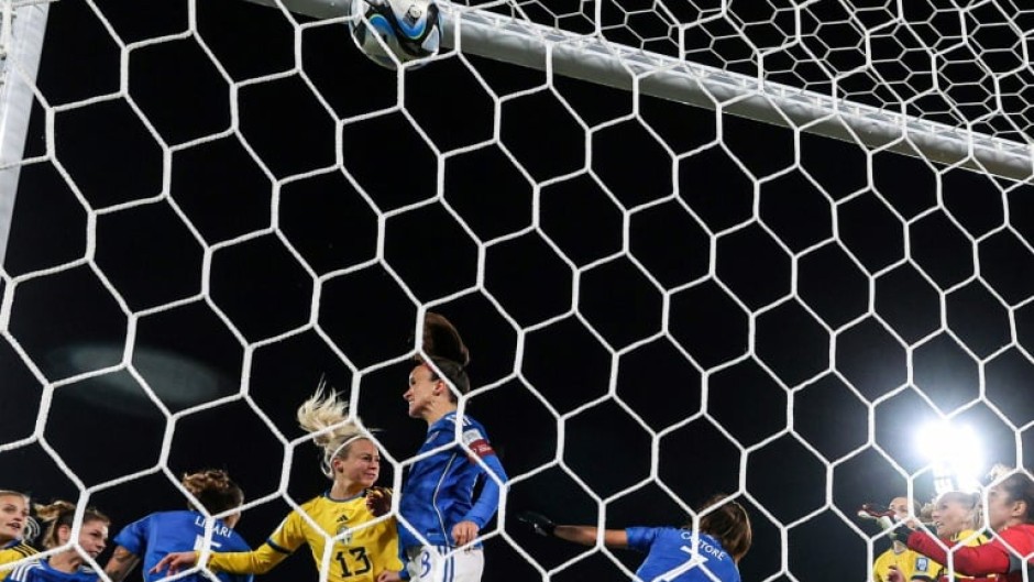 Sweden's defender Amanda Ilestedt heads her team's fourth
