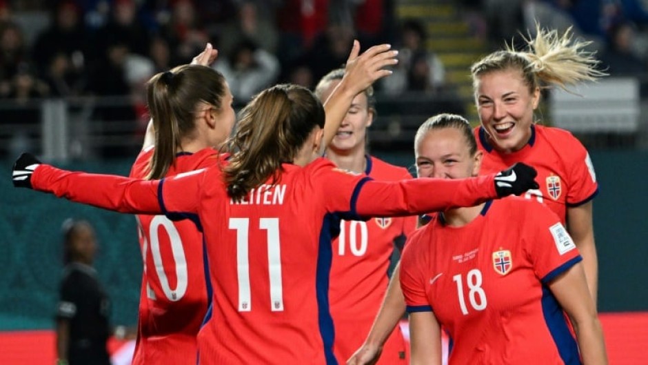 Norway players celebrate the fourth goal in their rout of the Philippines