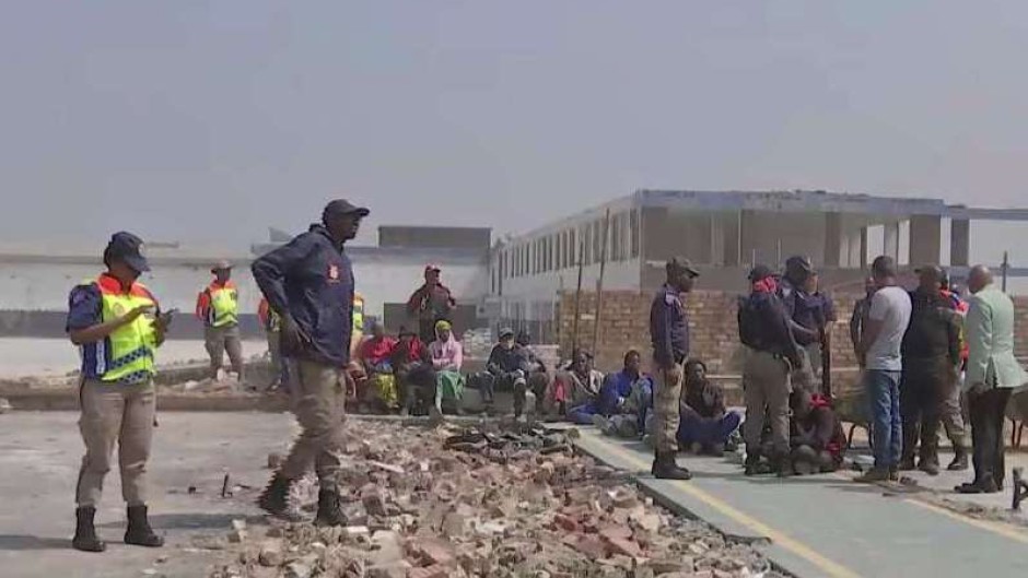 JMPD officers at the site of a hijacked building.