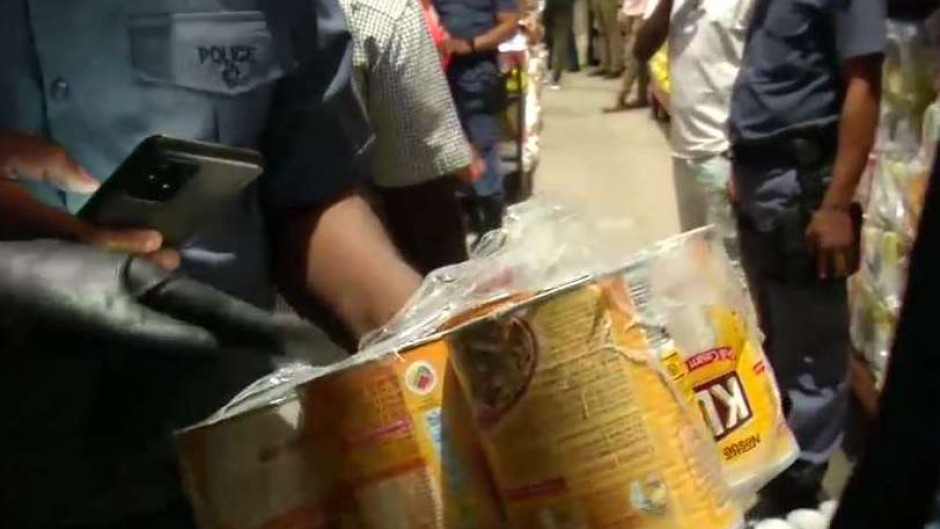 Police found some expired goods, including milk powder. eNCA