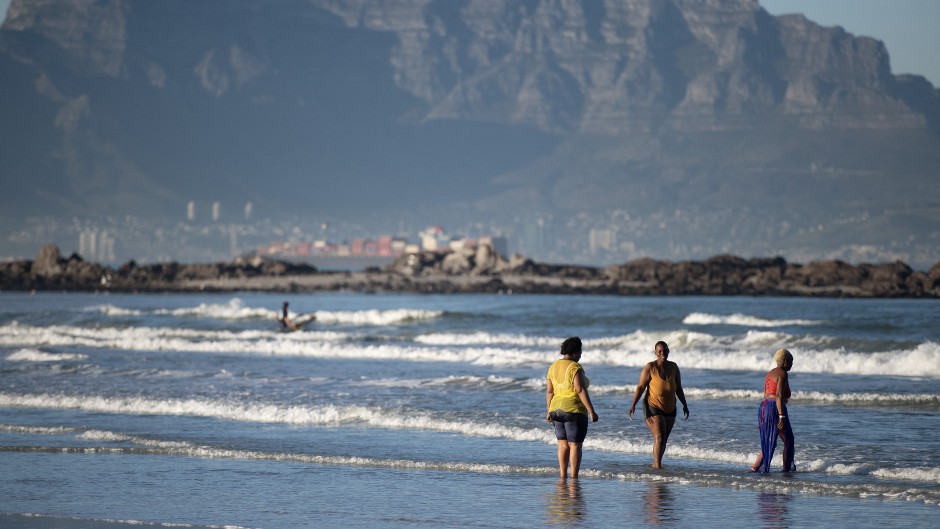 A view of Table Mountain, across Table Bay, from Bloubergstrand Beach, in Cape Town. 