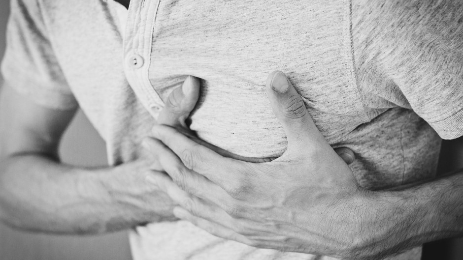 File: A person having chest pain. Image by Pexels from Pixabay