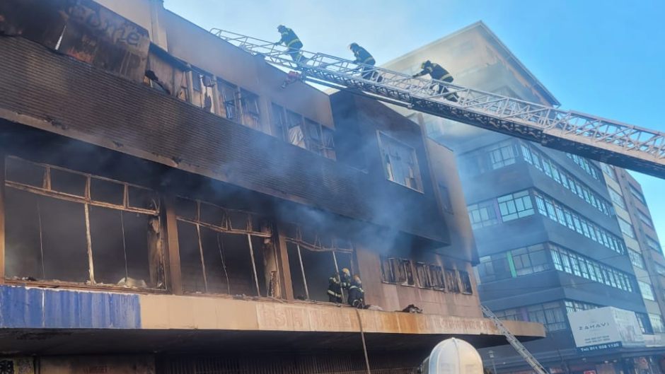 Firefighters on the scene of a building fire in the Joburg CBD. Picture supplied