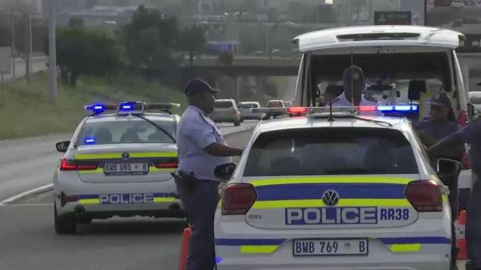 Police officers patrolling the M1 in Johannesburg. 