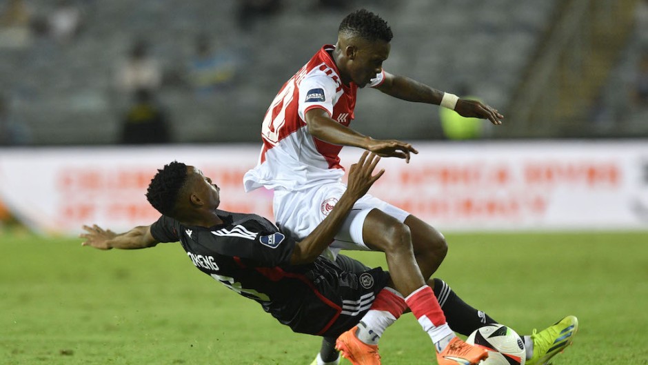 Katleho Maphathe of Cape Town Spurs tackled by Relebohile Mofokeng of Orlando Pirates. Sydney Mahlangu/BackpagePix