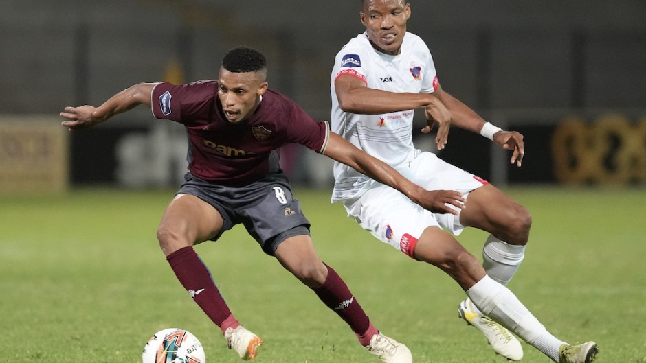 Sihle Nduli of Stellenbosch FC (L) vies for the ball with Elmo Kambindu of Chippa United (R). Nic Bothma/BackpagePix