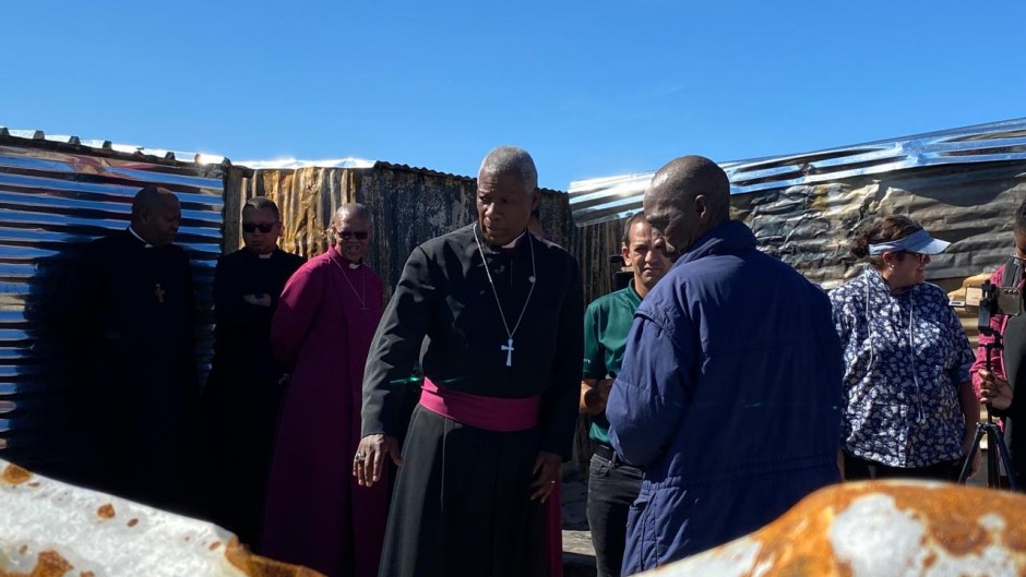 Anglican Archbishop Thabo Makgoba assessing the damage. eNCA/Kevin Brandt