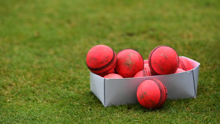 File: A box of used pink cricket balls are pictured on a pitch. AFP/Paul Ellis