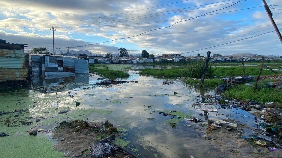 Bloekombos residents in Kraaifontein are demanding a more permanent solution be implemented to address frequent flooding in their homes. eNCA/Kevin Brandt