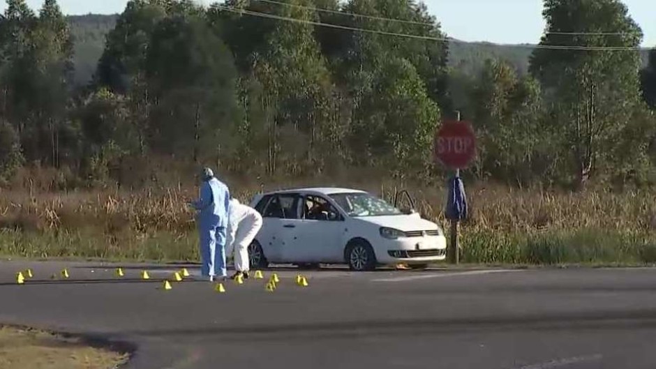 Crime scene investigators processing a scene of a police shootout in Harding, KZN