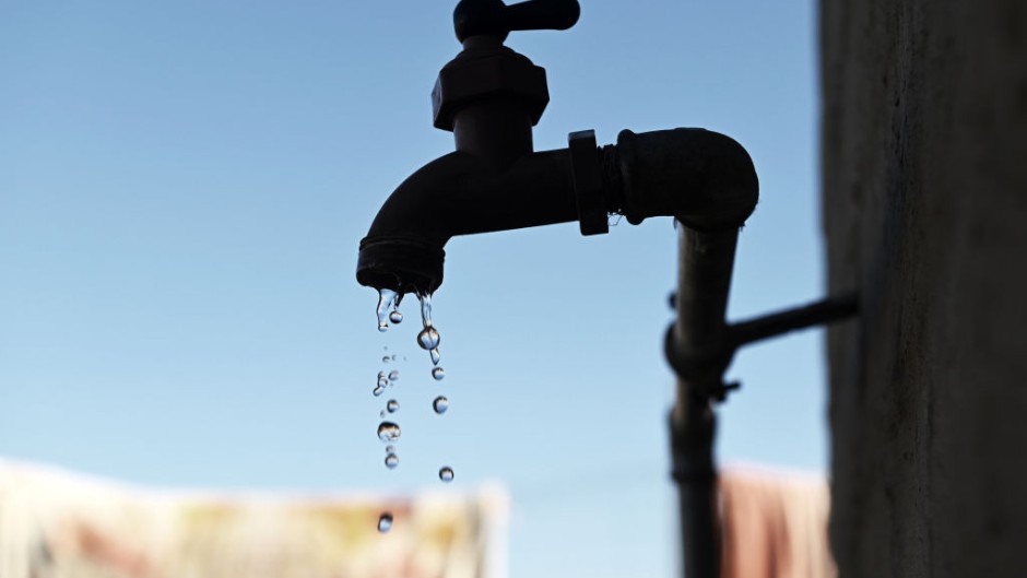 File: Water dripping from a tap.  Leon Sadiki/Bloomberg via Getty Images