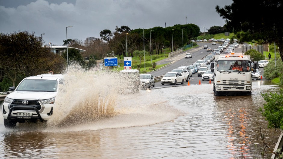 File: A flooded road surface. Jaco Marais/Die Burger/Gallo Images via Getty Images