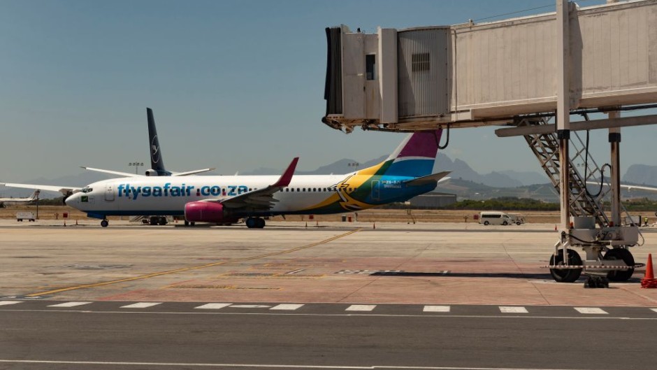 File: A FlySafair plane at Cape Town International airport. Peter Titmuss/UCG/Universal Images Group via Getty Images