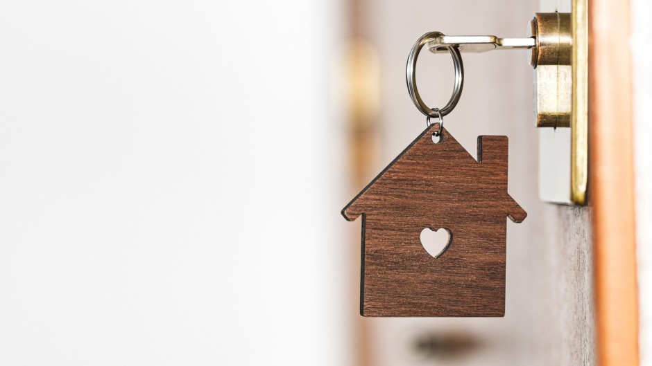 File: Wooden key chain in the shape of a house. GettyImages/Nando Vidal