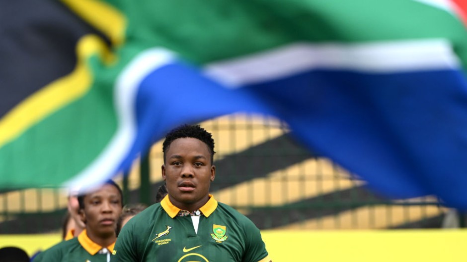 Babalwa Latsha of South Africa leads the team out prior to the WXV 2 2023 match between Italy and South Africa at Athlone Sports Stadium. Johan Rynners/World Rugby via Getty Images